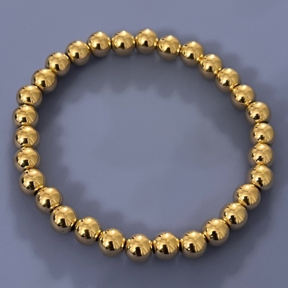 New 14K Yellow Gold-Filled 6 mm stretch Bead 6 1/2" Bracelet - Picture 3 of 4